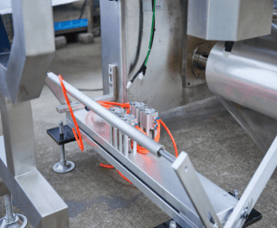 Bộ phận đục lỗ tự động cho túi rau, giúp rau trong túi không bị mờ